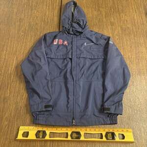 NIKE Team USA Vintage Olympic Dark Blue Hooded Waterproof Jacket 
Size: Small
Co